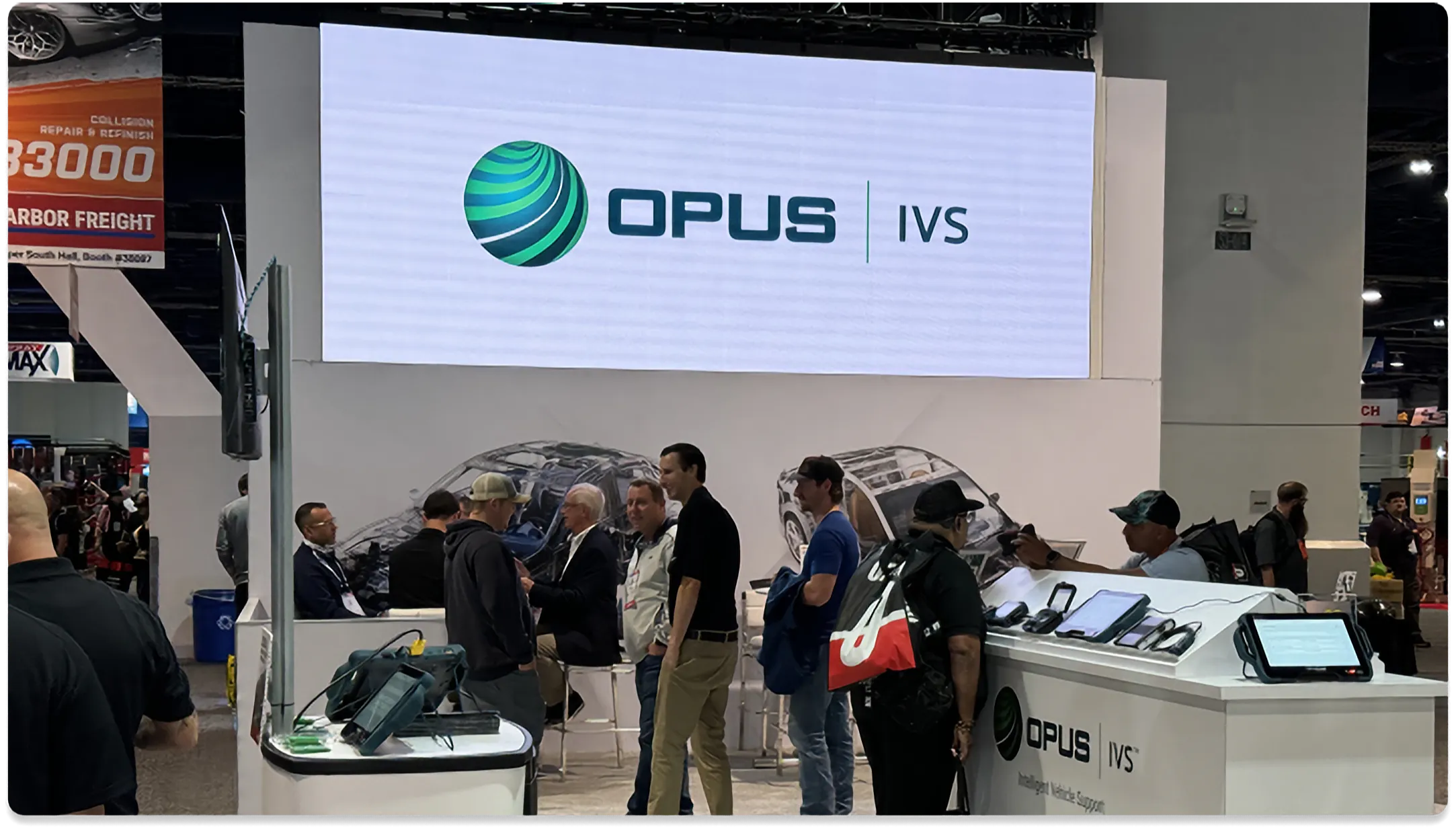Repairify team at the SEMA Show booth